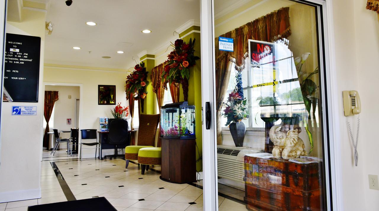 Scottish Inn And Suites Alvin Bagian luar foto