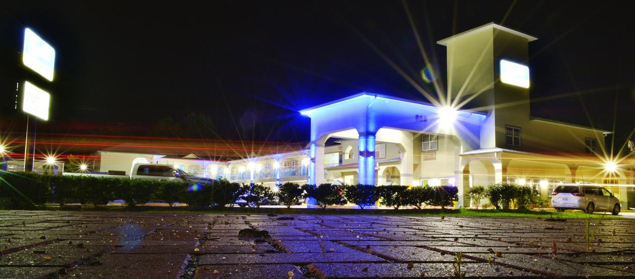 Scottish Inn And Suites Alvin Bagian luar foto