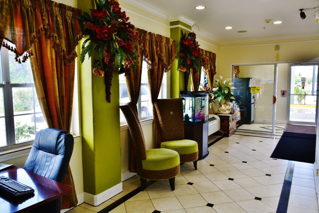 Scottish Inn And Suites Alvin Bagian luar foto