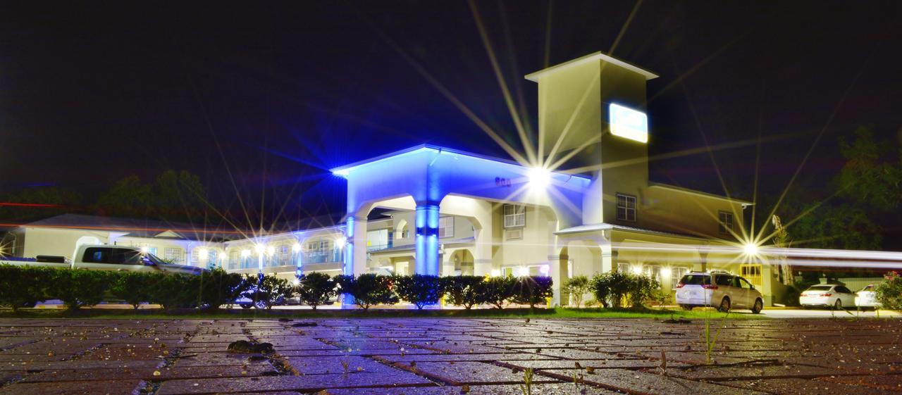 Scottish Inn And Suites Alvin Bagian luar foto
