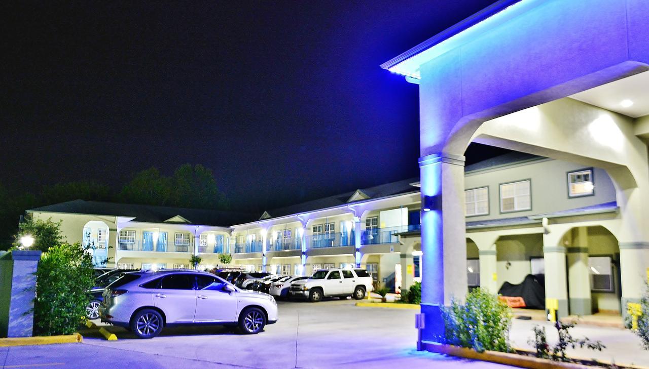 Scottish Inn And Suites Alvin Bagian luar foto